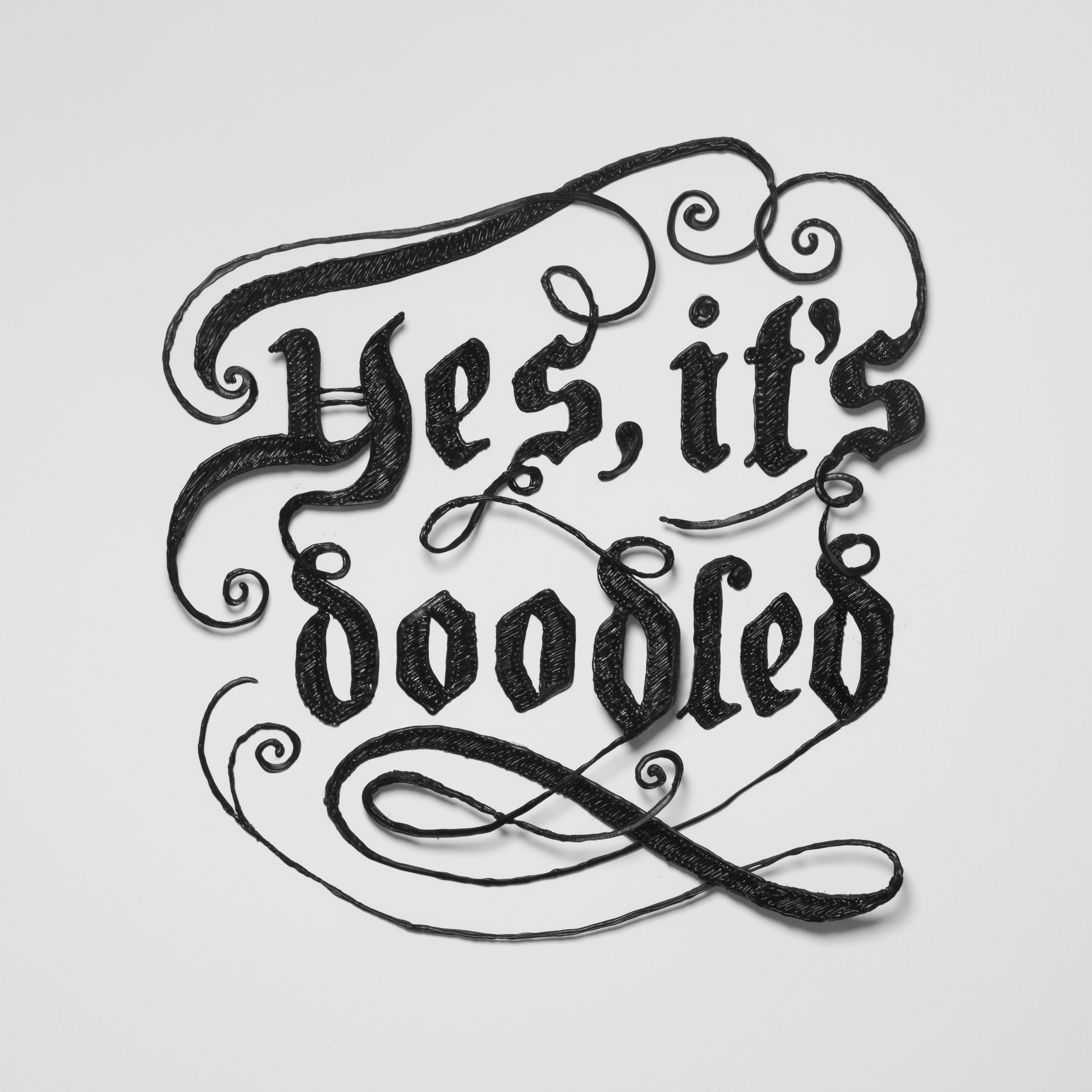 Close up of black & white 3D handwritten phrase - 3D pen art